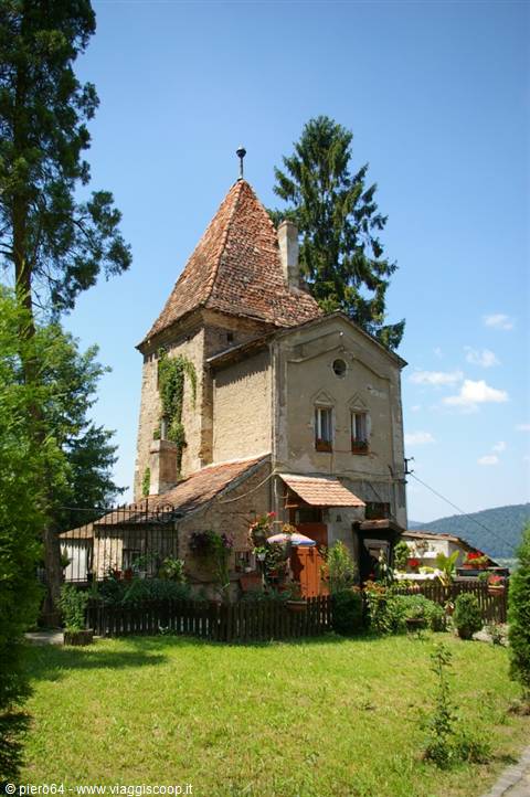 Shoemakers' Tower in Sighișoara, tiled roof and flower garden