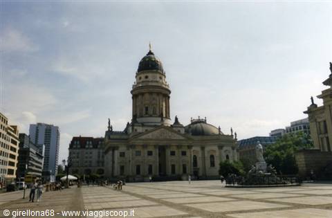 The Deutscher Dom with its dome overlooks Gendarmenmarkt square in Berlin