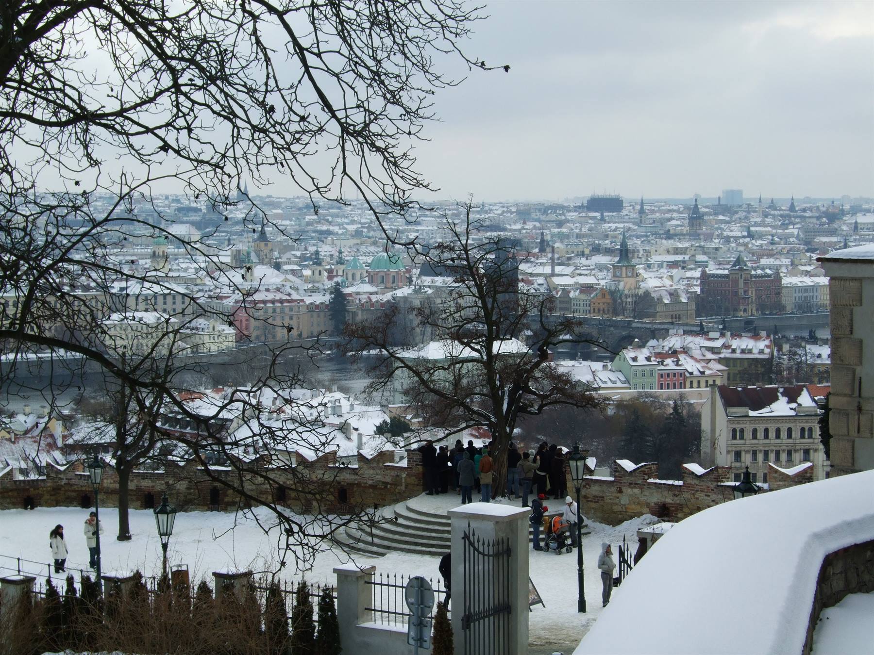 Prague rooftops whitened by snow