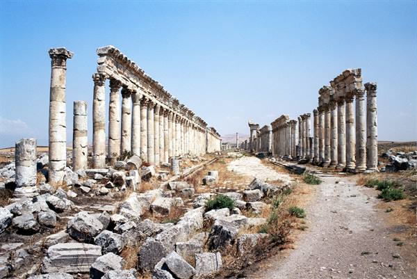 Roman stone colonnade at Apamea, dirt path among fallen columns