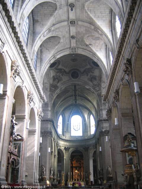 Stone vaults of Saint-Sulpice nave in Paris, light through windows