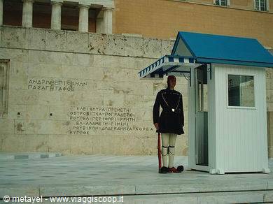 Evzone guard standing sentry by the sentry box at the Tomb of the Unknown Soldier, Athens