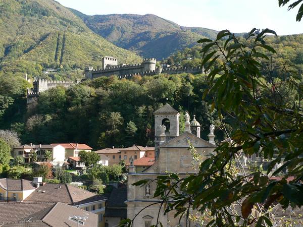 Castelgrande and the medieval walls above Bellinzona rooftops