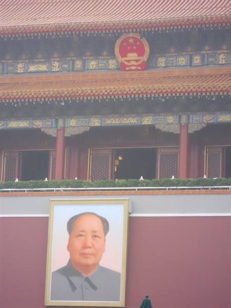 Mao Zedong portrait on the Tiananmen gate under hazy light