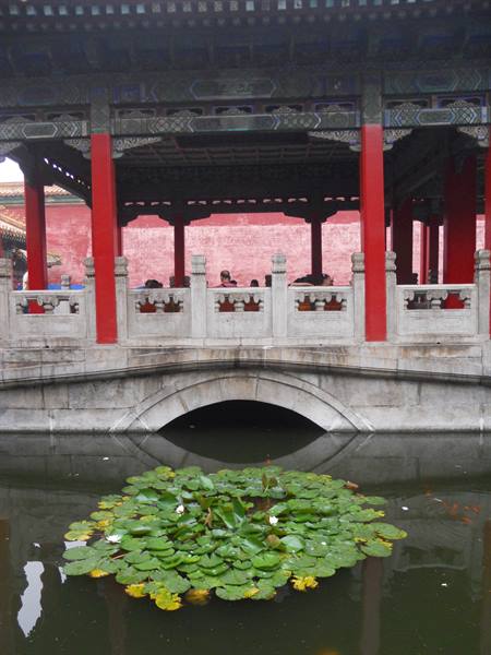 Stone bridge with water lilies, red-columned pavilion, Forbidden City