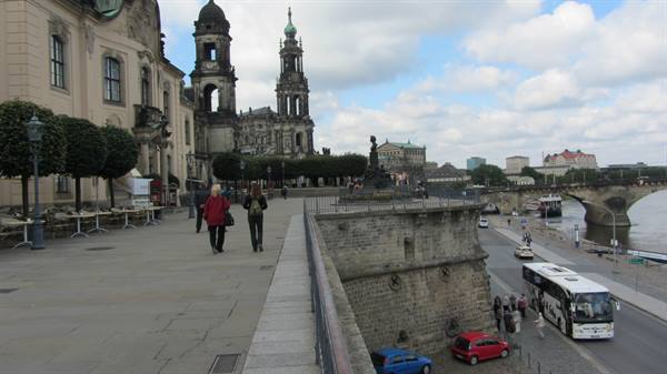 Brühl's Terrace in Dresden: people walking, Hofkirche church, Elbe river and bus below