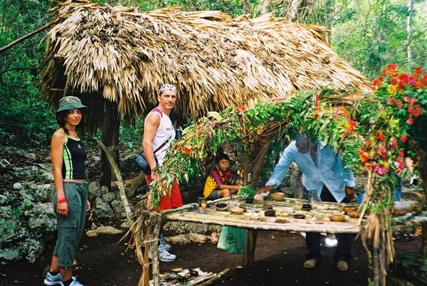 in the jungle doing a maya rite