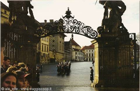Changing of the guard at the wrought iron gate of Prague Castle