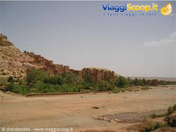 The earthen ksar of Aït Benhaddou beneath a clear blue sky