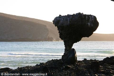 Mushroom rock formation at Cabo San Lucas above the waves