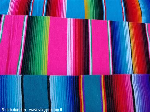 Colorful striped Mexican serape fabrics for sale in Loreto