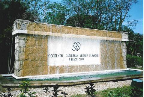 Stone sign with cascading water at Occidental Caribbean Village Playacar