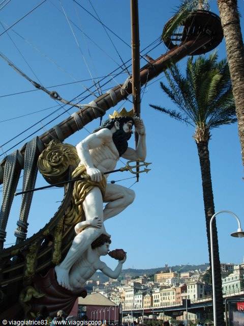 Neptune statue with trident on a galleon's bow at Genoa harbor