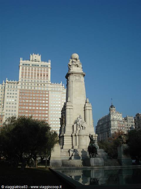 Cervantes monument at Plaza de España, Madrid, with equestrian statue and towers