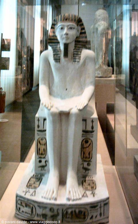 Seated limestone pharaoh statue with hieroglyphs, Egyptian Museum, Turin