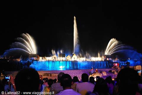 Night light and water fountain show, crowd watching on Sentosa beach