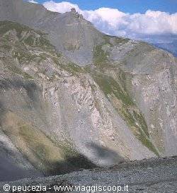 a decidedly unsettling mountain ridge as you pass alongside it...