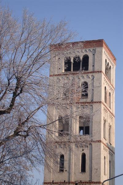 Torre delle Milizie, brick and arched windows among bare winter branches