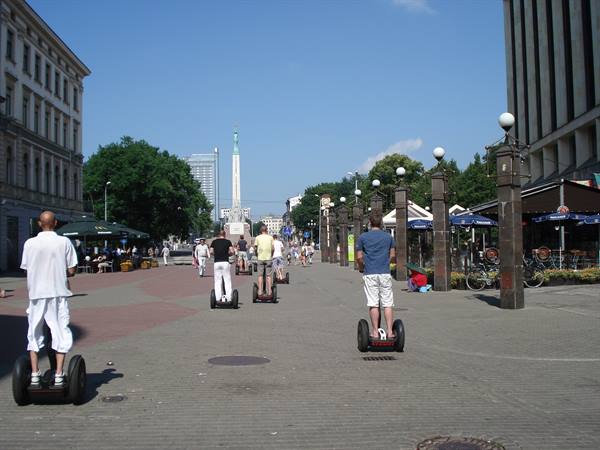 Tourists on segways near the Freedom Monument