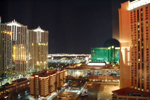 Las Vegas Strip towers glowing at night with neon lights and casinos