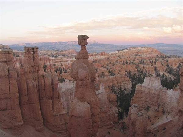 Thor's Hammer, Bryce Canyon: pink rock spire rising among hoodoo amphitheaters in evening light