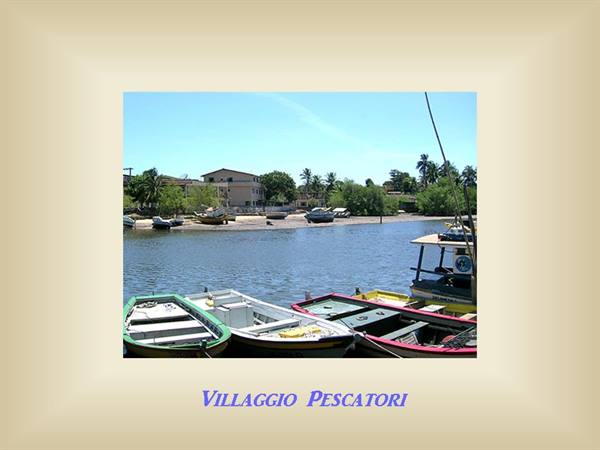 Colorful boats moored along the river in the fishermen village