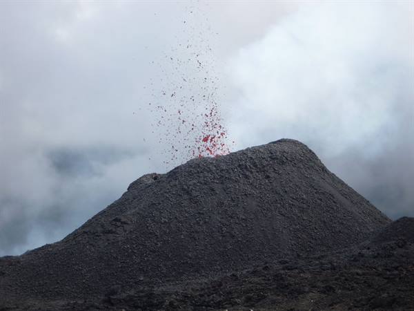 Piton de la Fournaise volcano (2632m) erupting.