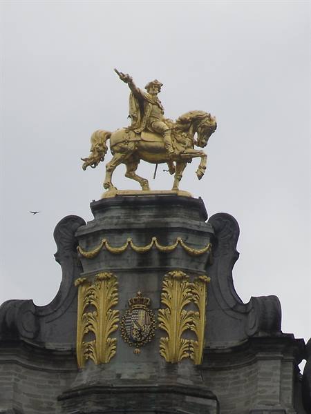 detail of a gilded statue in the grand place