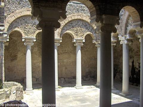 Marble Roman columns among brick arches at San Giovanni al Sepolcro church, Brindisi