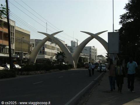 Mombasa's giant steel tusks arching over the busy city road