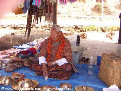 a vendor at the market of thimpu