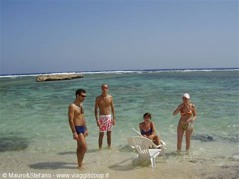 Stefano and Mara with the friends met in the village Gio' and Nency..