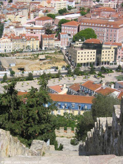 Lisbon rooftops and buildings seen from São Jorge Castle stone walls