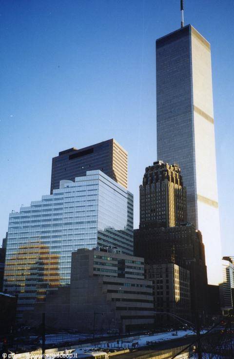 North Tower of the World Trade Center rising above Manhattan skyscrapers in morning light