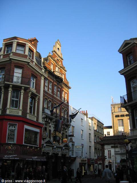 Red brick buildings on Wardour Street, London, at the entrance to Chinatown