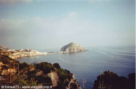 Rocky headland of Sant'Angelo, Ischia, rising above the blue sea