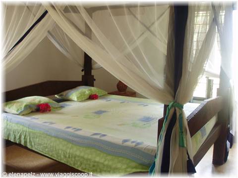 Our romantic four-poster bed at Kikka's house