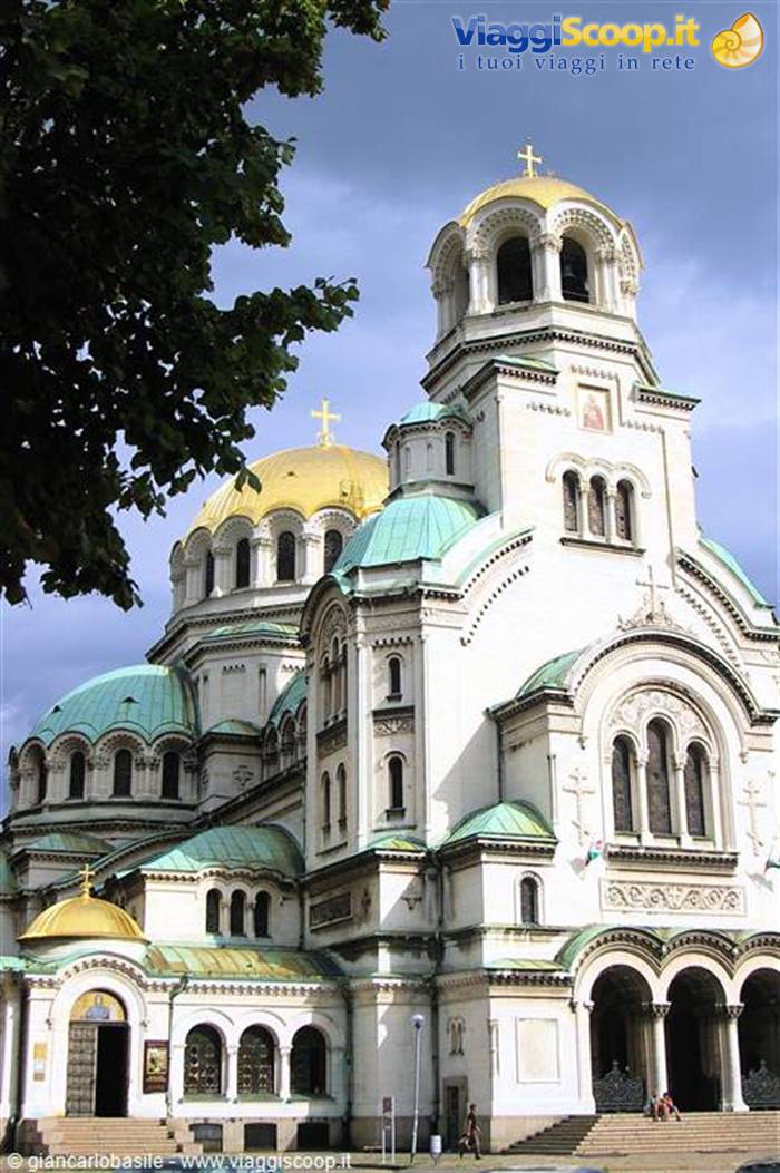 Alexander Nevsky Cathedral in Sofia, golden and green domes under cloudy sky