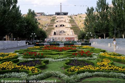 Flower gardens in front of the Yerevan Cascade with stepped terraces