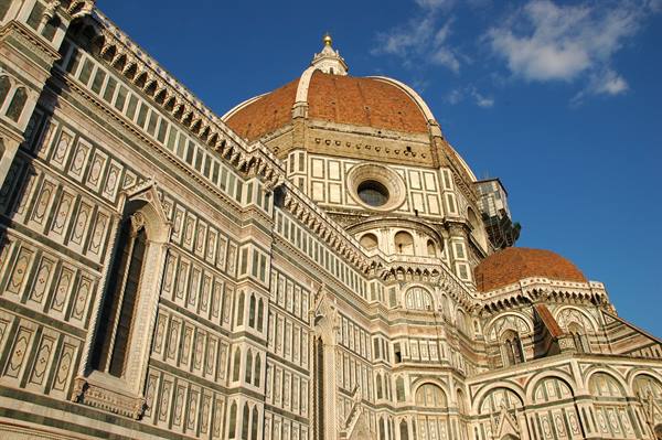 The dome of Florence Cathedral with white and green marble facade