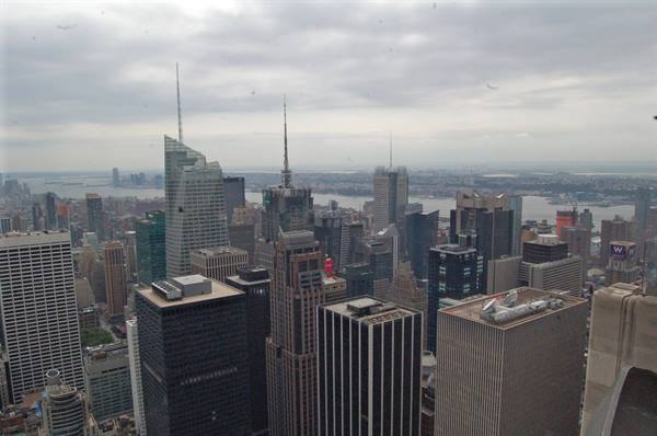 Manhattan skyscrapers under cloudy sky, Empire State Building, Hudson River in background