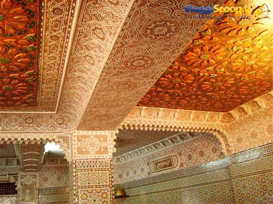 Carved cedar wood and stucco ceiling of Telouet Kasbah, warm golden light